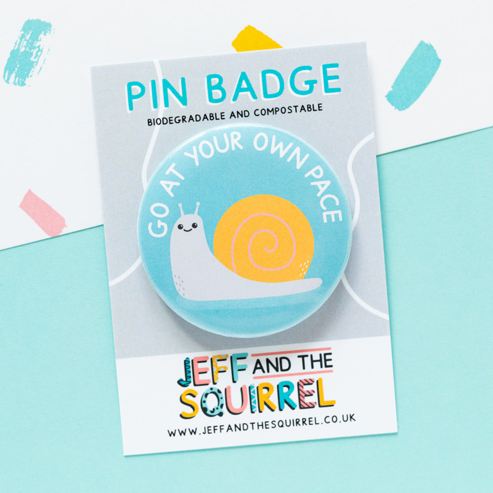 Go At Your Own Pace Snail Badge – Jeff and the Squirrel